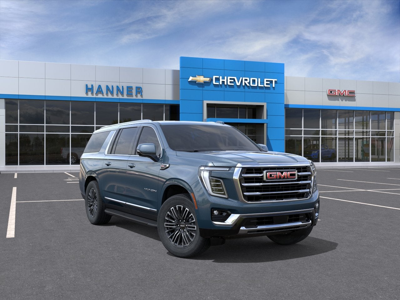 2026 GMC Yukon XL Elevation in Downpour Metallic — front three-quarter view