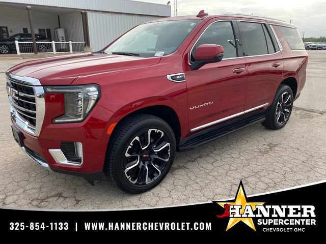 2022 GMC Yukon SLT in Cayenne Red Tintcoat — front three-quarter view