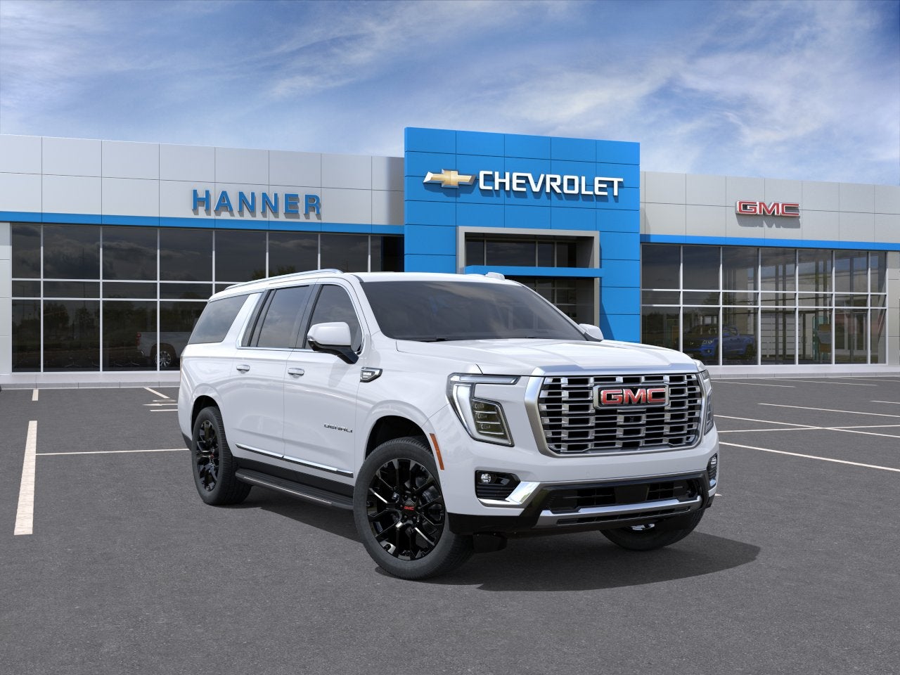 2026 GMC Yukon XL Denali in Glacier White Tricoat — front three-quarter view