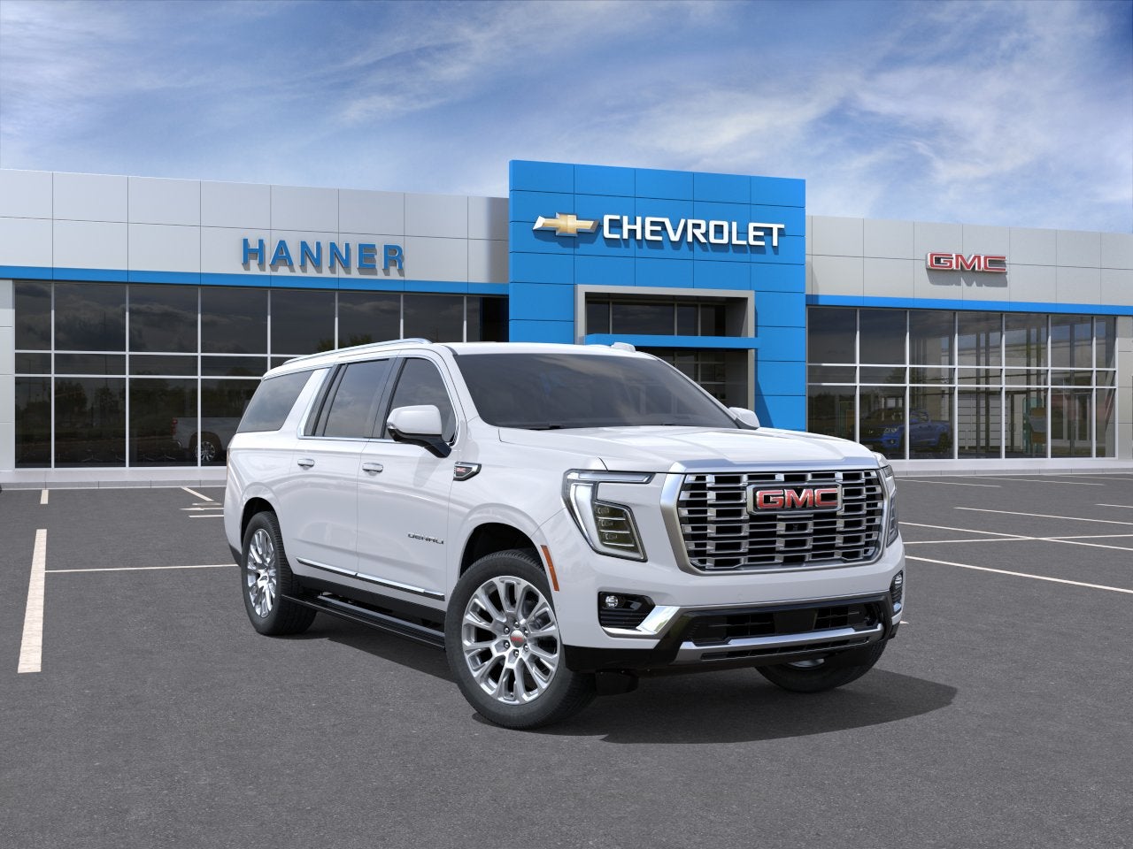 2026 GMC Yukon XL Denali in Summit White — front three-quarter view