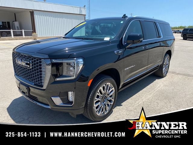 2024 GMC Yukon XL Denali Ultimate in Onyx Black — front three-quarter view