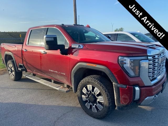 2024 GMC Sierra 2500 HD Denali in Volcanic Red Tintcoat — front three-quarter view