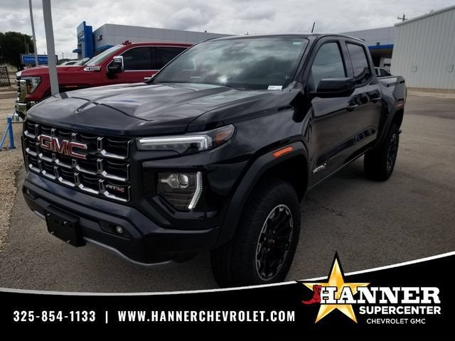 2026 GMC Canyon AT4 in Onyx Black — front three-quarter view