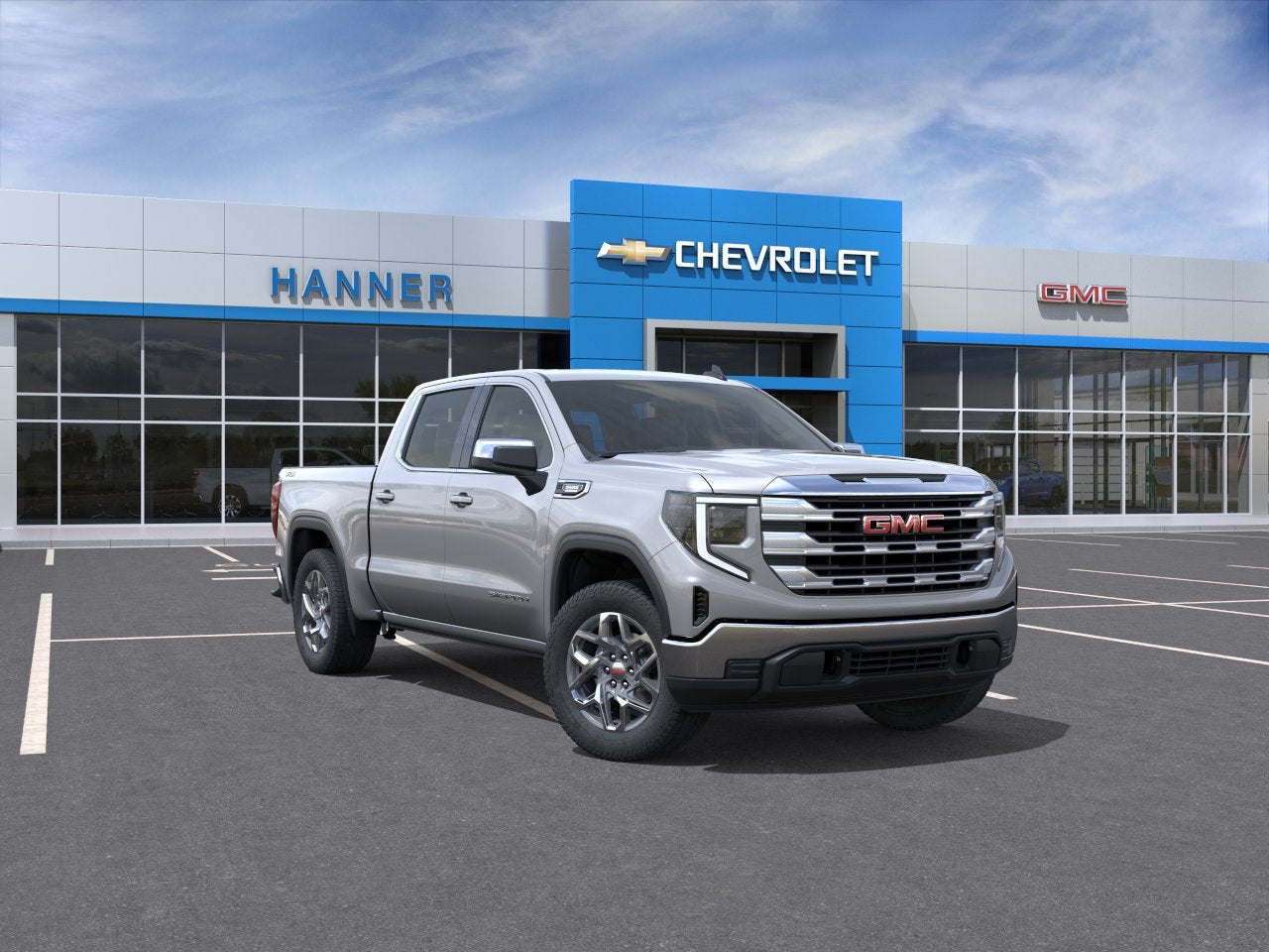 2026 GMC Sierra 1500 SLE in Sterling Metallic — front three-quarter view