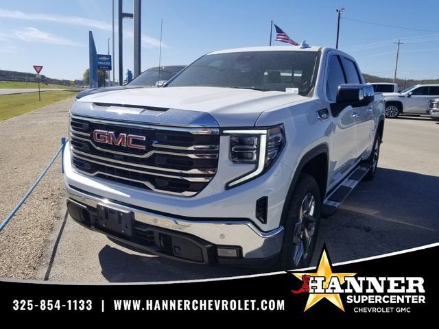 2026 GMC Sierra 1500 SLT in Glacier White Tricoat — front three-quarter view