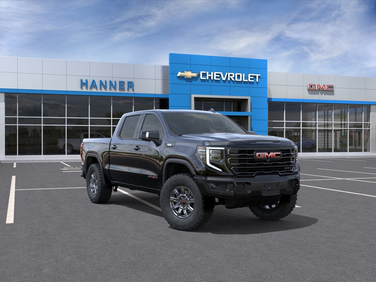 2026 GMC Sierra 1500 AT4X in Onyx Black — front three-quarter view