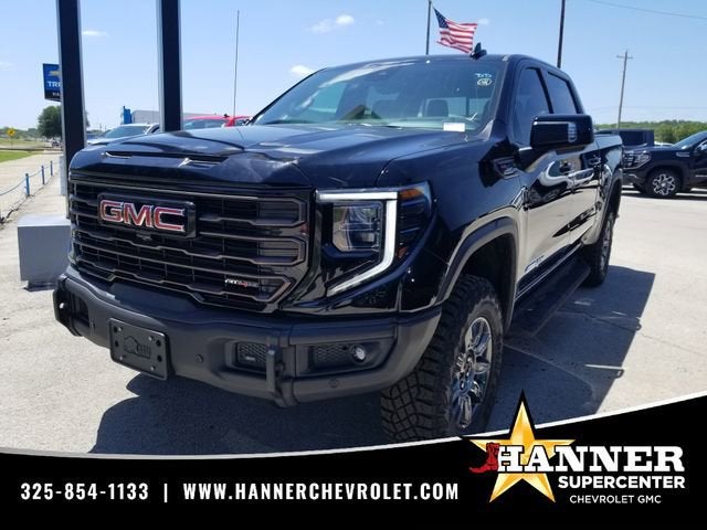 2026 GMC Sierra 1500 AT4X in Onyx Black — front three-quarter view